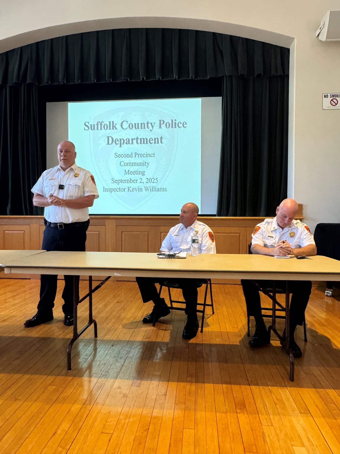Inspector Kevin Williams leads the meeting with Deputy Inspector Steven Rhode and Captain Kyle Simcox seated - Suffolk County Police Department 2nd Precinct Meeting Sept 2025.