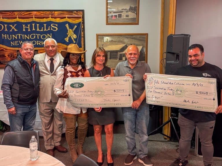 Huntington Station Business Improvement District presents a $5,000 donation and Frank Antonetti, Owner - 9th Street Auto Collision presents a matching $5,000 donation. Sal Ferro - Founder, Ferro Foundation and Town Councilman; Andre Sorrentino - Founder, Sorrentino Family Foundation and Highway Superintendent; Rhonda Gooden, Maria Lella and Frank Cosentino - Board of Directors, Huntington Station BID with Frank Antonetti. Sorrentino Turkey Fundraiser 2025