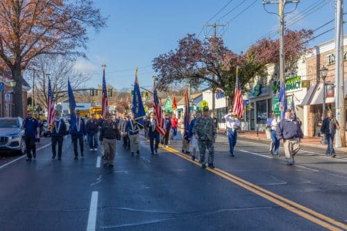 Flag colors and Veterans at the start of the parade. Veterans Day Parade