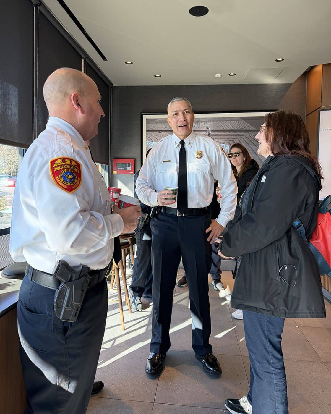 Suffolk County Police Department 2nd Precinct Deputy Inspector Steven Rohde, Inspector Markus Rivera and June Margolin - Huntington Matters. Welcoming Inspector Markus Rivera at Coffee With A Cop
