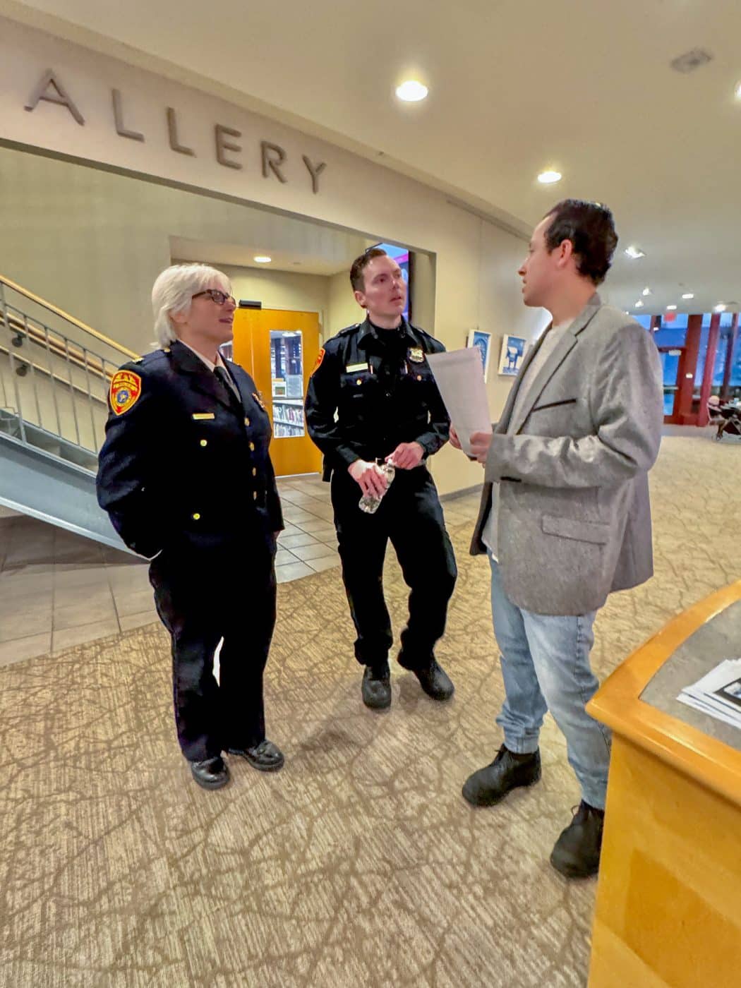 SCPD Officers speak with an interested resident. Suffolk County Police Department Recruitment Information Session