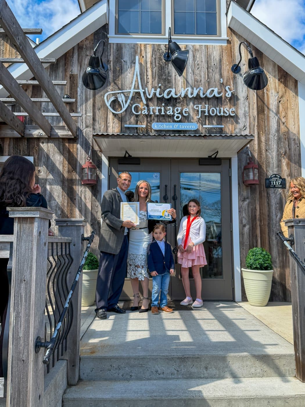 The Oliva Family - Leonard, Patricia, Leo, and Avianna - the restaurant's namesake. Ribbon Cutting - A Labor of Love: Inside Avianna’s Carriage House