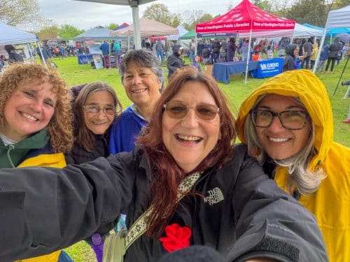 Dana E. Richter, Diane Schaber and June Margolin (center) from Huntington Matters with neighbors Gail Lamberta (blue jacket) - St. Joseph's University and Janine Salgado (yellow jacket) - Huntington Youth Bureau. Huntington Family Earth Day Highlights Environmental Programs and Wildlife Education