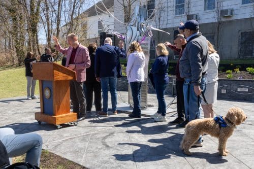 Old First Presbyterian Church Pastor Matthew Means blessing the Hope and Healing Sculpture and the community. Hope & Healing Sculpture Blessing in Huntington