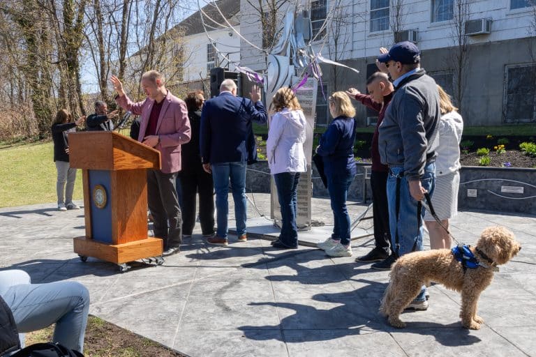Old First Presbyterian Church Pastor Matthew Means blessing the Hope and Healing Sculpture and the community. Hope & Healing Sculpture Blessing in Huntington