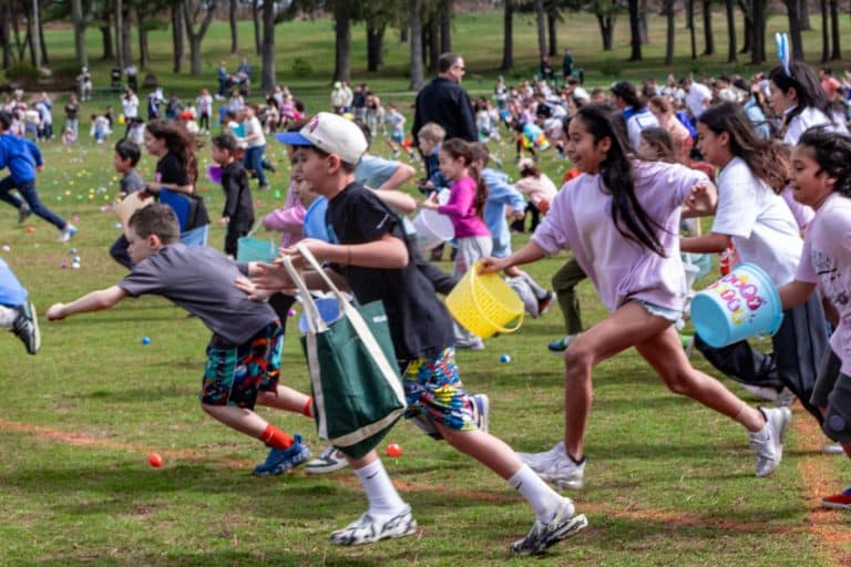 The crowd of older kids running for Easter Eggs. Town of Huntington Easter Egg Hunt 2026