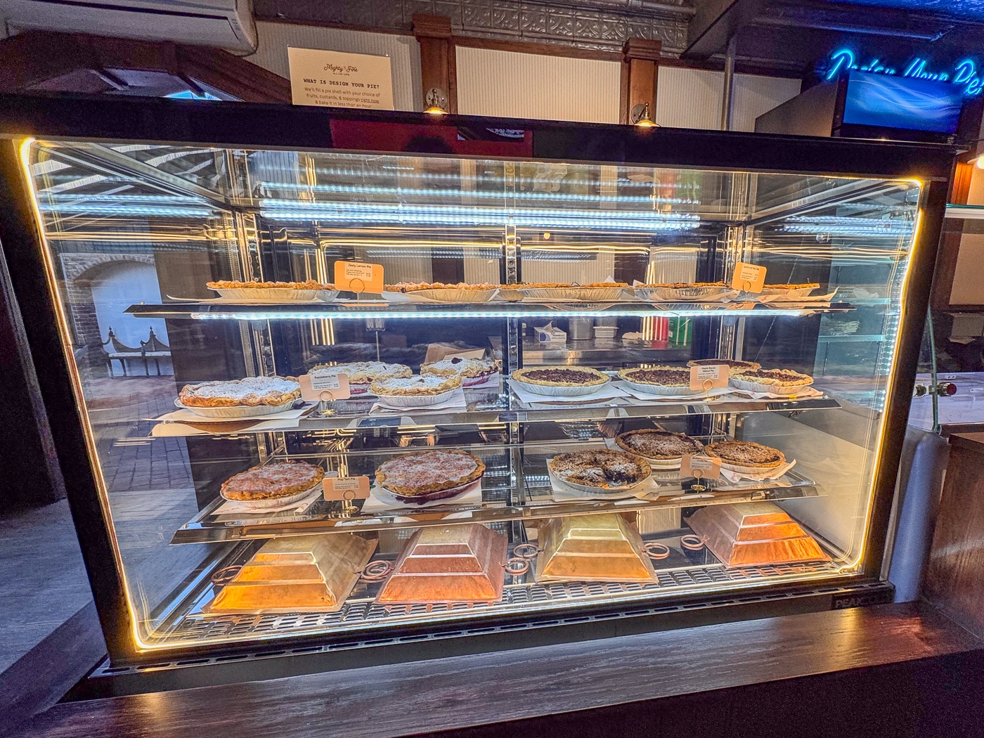 Beautifully displayed pie and quiche options. A Slice of Nostalgia Meets Something New at Mighty Fine