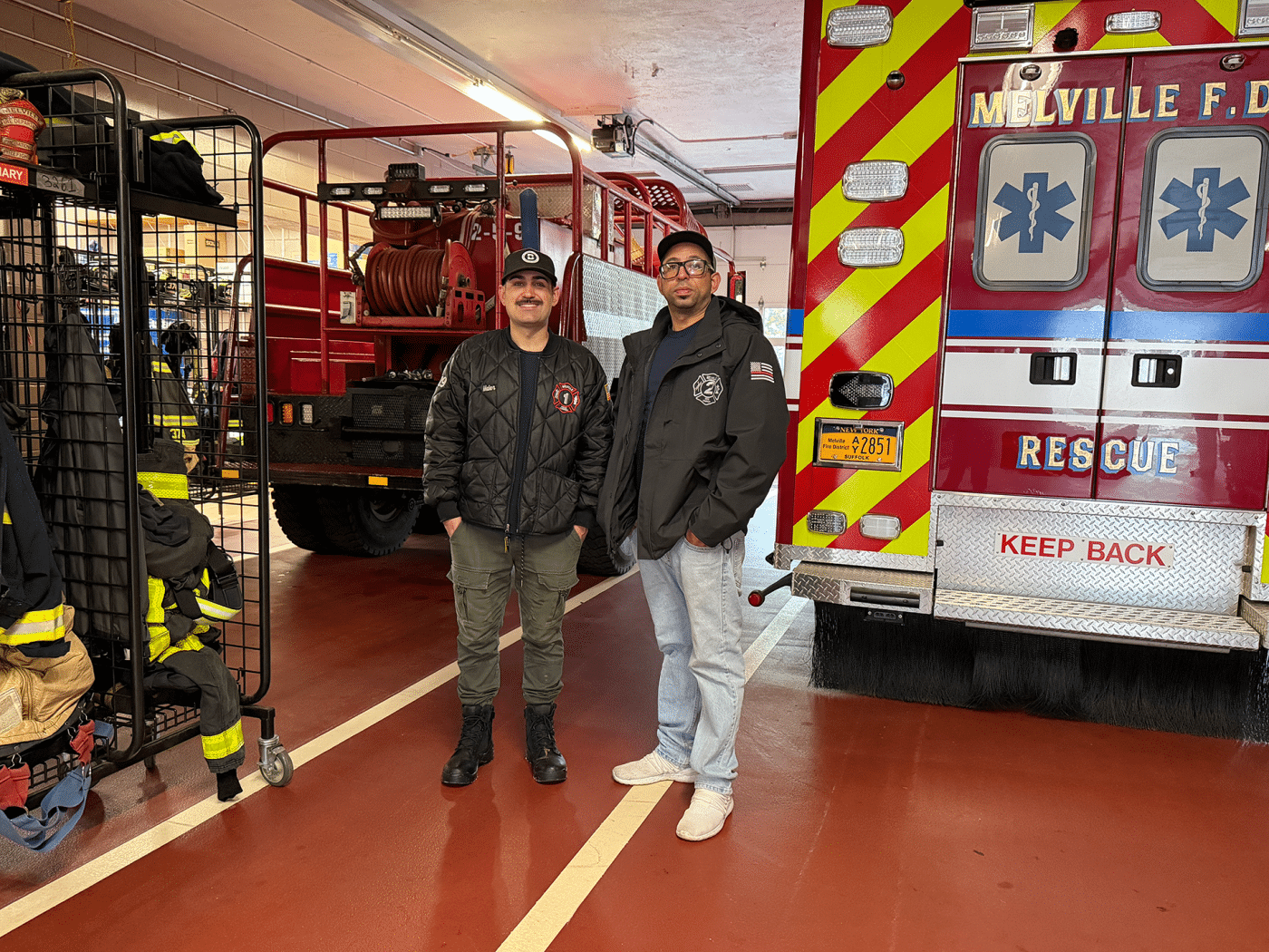 Firefighter Chad Maier, 28 and Firefighter Ramon Santana, 38 - Melville Fire Department. A Community Within the Community: The Volunteer Firefighters and EMTs of Huntington