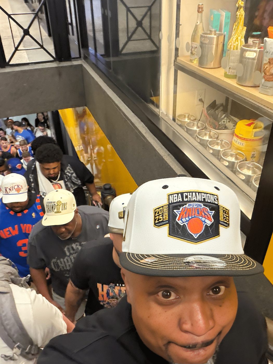 Walter Edwards among the crowd of fans climbing the steps to exit Penn Station. Crowds, Chaos, and Knicks Pride: One Fan’s Parade Experience