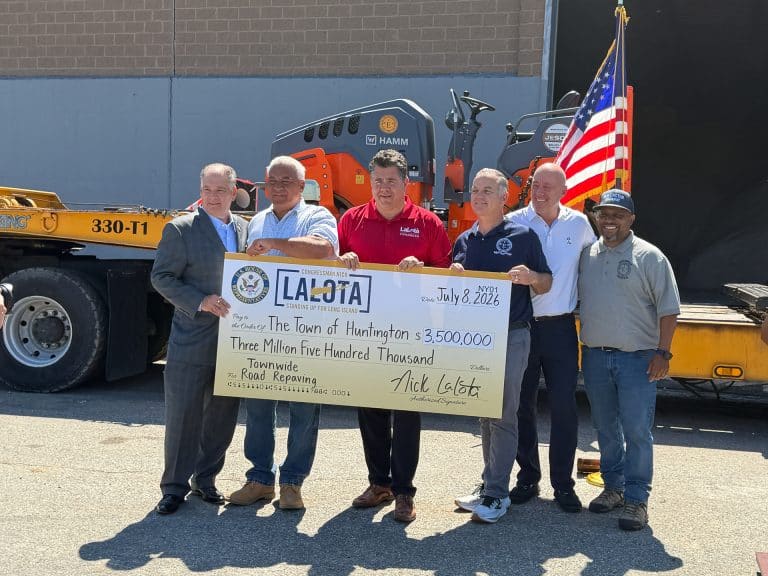 New York State Senator Mario Mattera, Huntington Superintendent of Highways Andre Sorrentino, Congressman Nick LaLota, Town of Huntington Supervisor Ed Smyth, Deputy Superintendents of Highways George Schwertl and Walter Edwards. Huntington Receives $3.5M Federal Grant for Road Paving