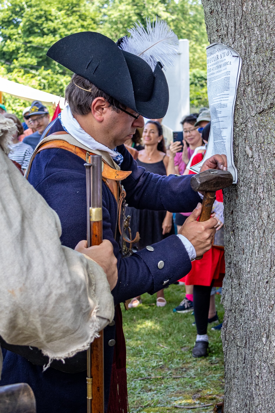 Huntington Militia Commander Commander Patrick Mantle replaces the King's posted Intolerable Acts with the Declaration of Independence for the public to read. Huntington Recreates July 22, 1776 During America's 250th Celebration