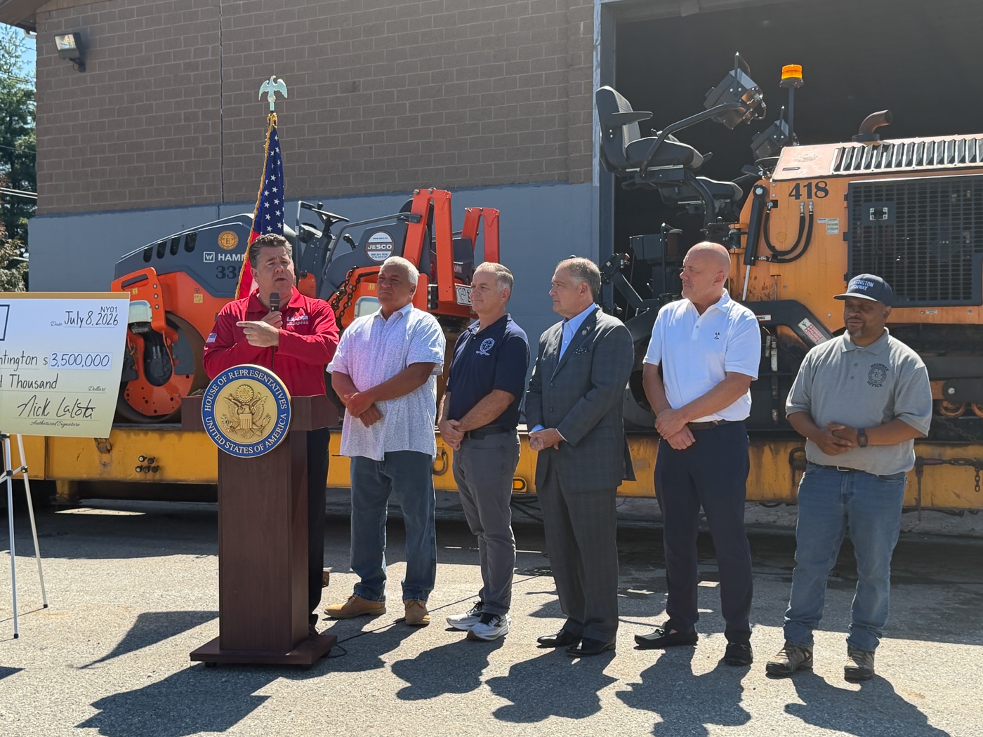 Congressman Nick LaLota, Huntington Superintendent of Highways Andre Sorrentino, Town of Huntington Supervisor Ed Smyth, New York State Senator Mario Mattera, Deputy Superintendents of Highways George Schwertl and Walter Edwards. Huntington Receives $3.5M Federal Grant for Road Paving