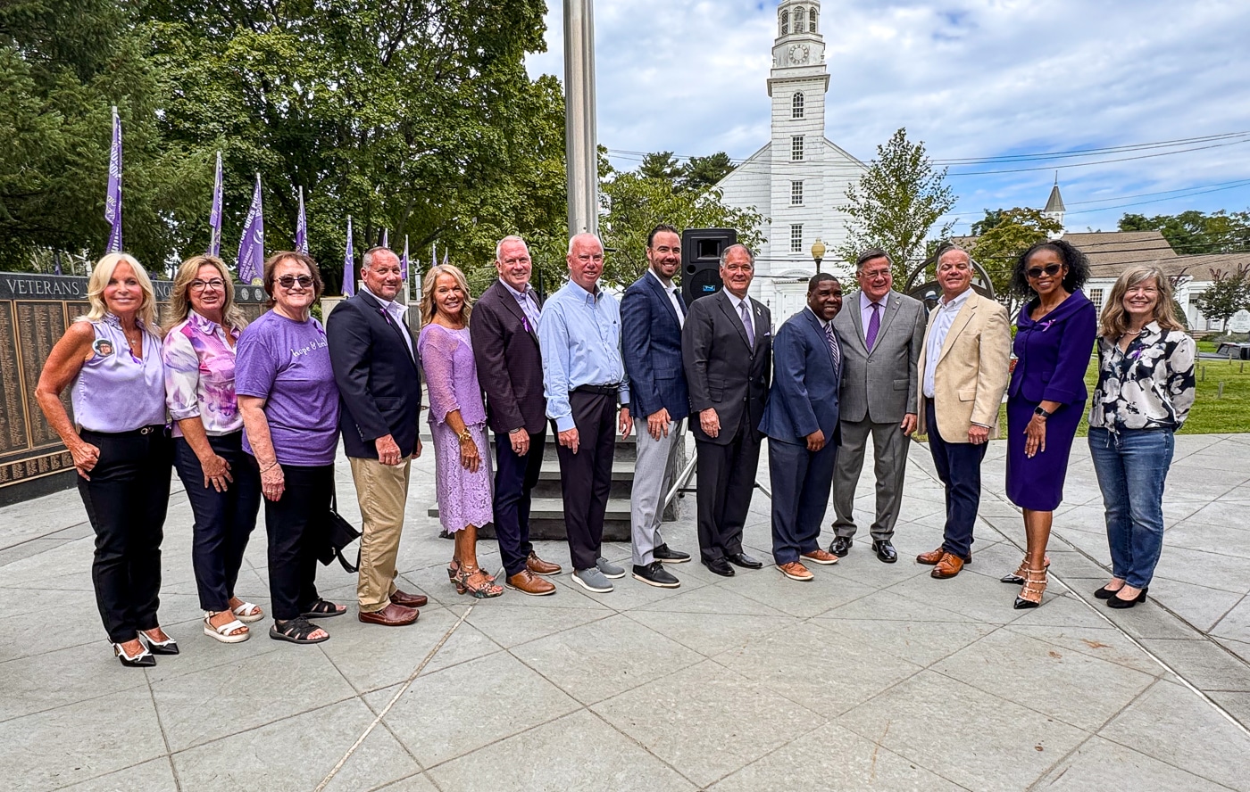 Opioid and Addiction Task Force Member Sharon Richmond and colleague, Co-Chair Mary Silberstein, Northport Village Trustee David Weber, Councilwoman Theresa Mari, Co-Chair Jeff Reynolds, Suffolk County Legislator Tom Donnelly, Executive Director of LICADD Chris Kelly, NYS Senator Mario Mattera, Suffolk County Legislator Jason Richberg, Suffolk County Executive Ed Romaine, Huntington Supervisor Ed Smyth, Receiver of Taxes Jillian Guthman, Councilwoman Jen Hebert. Huntington ‘Goes Purple’ to Kick Off National Recovery Month, Raising Flag of Hope and Remembrance