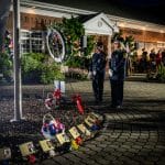 Melville Fire Department volunteers pay their respects. Photo Stories: Melville Gathers by Candlelight to Remember September 11