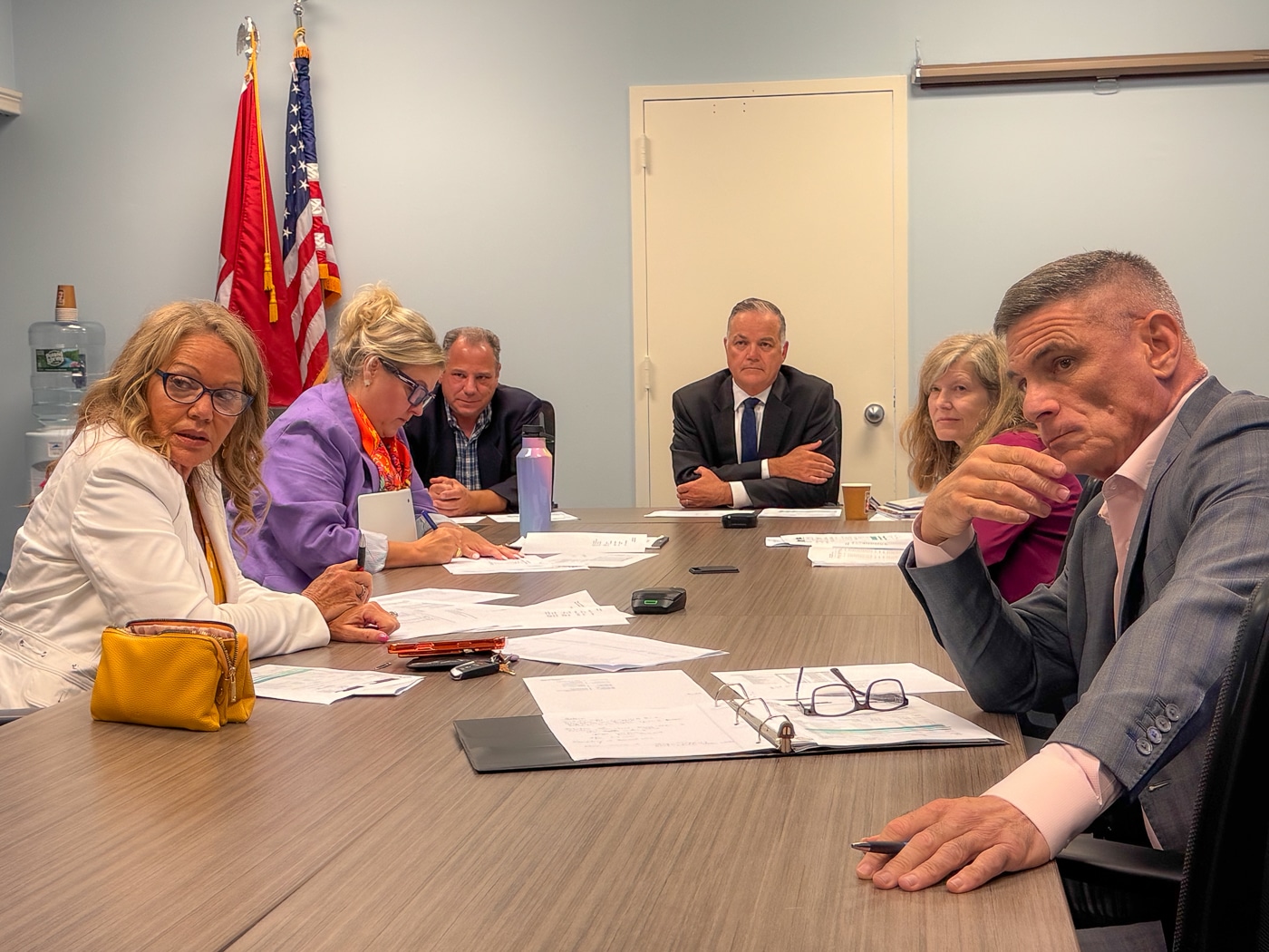 Councilwoman Theresa Mari, Councilwoman Brooke Lupinacci, Town Clerk Andrew Raia, Supervisor Ed Smyth, Councilwoman Jen Hebert and Councilman Dr. Dave Bennardo. Huntington Weighs Cuts as 19% Tax Increase Enters Budget Talks