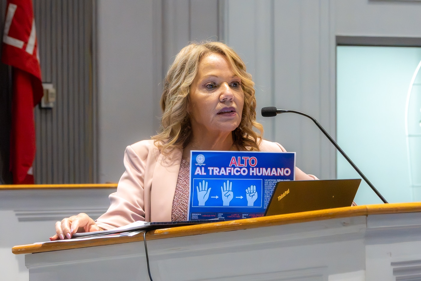 Councilwoman Theresa Mari, Town of Huntington hangs human trafficking awareness and resource signs on bathroom stall doors in Town of Huntington parks and beaches. The Hidden Crisis Next Door: How Huntington is Confronting the Stark Reality of Human Trafficking