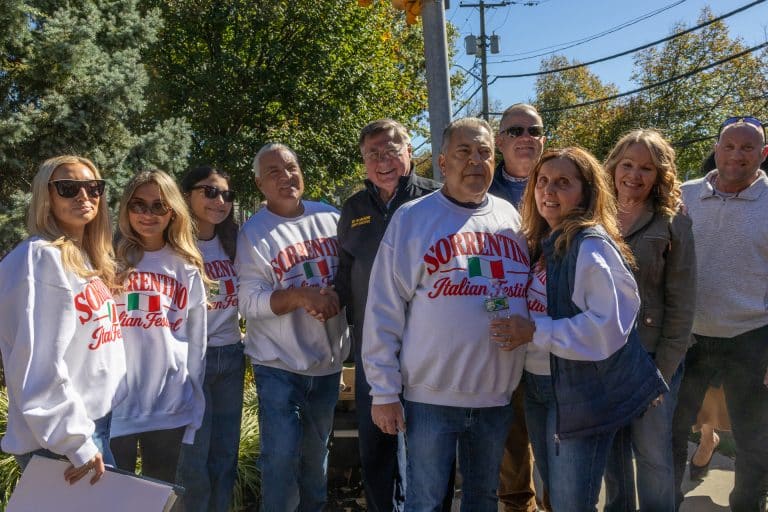 The Sorrentino Family with Suffolk County Executive Ed Romaine (black jacket), Supervisor Ed Smyth (sunglasses), Town Councilwoman Therea Mari (green), Northport Village Trustee and Assembly Candidate Dave Weber (right). Photo Stories: Sorrentino Way Street Dedication & First Annual Huntington Italian Festival