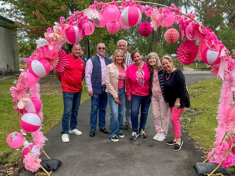 Kicking off the walk under the pink arch Candidate for NYS Assembly Dave Weber - Northport Trustee, Hon. Joshua Price, Breast Cancer Survivor Councilwoman Theresa Mari, Andre Sorrentino (checked shirt) - Huntington Superintendent of Highways, Michelle Wright - Councilwoman Mari's Legislative Aide, Councilwoman Jennifer Hebert and County Legislator Rebecca Sannin. Pink in the Park Brings Awareness, Hope and Support to Huntington